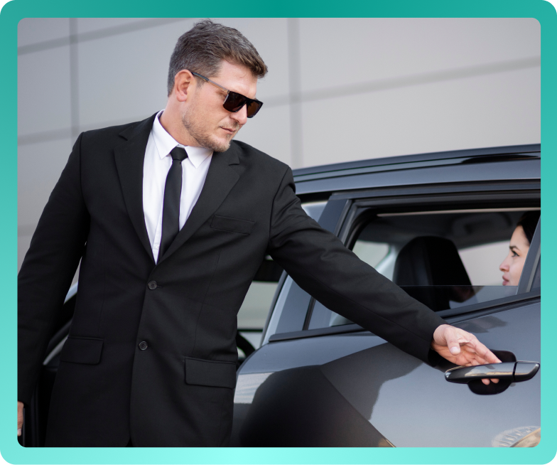 Chauffeur helping a client into the car